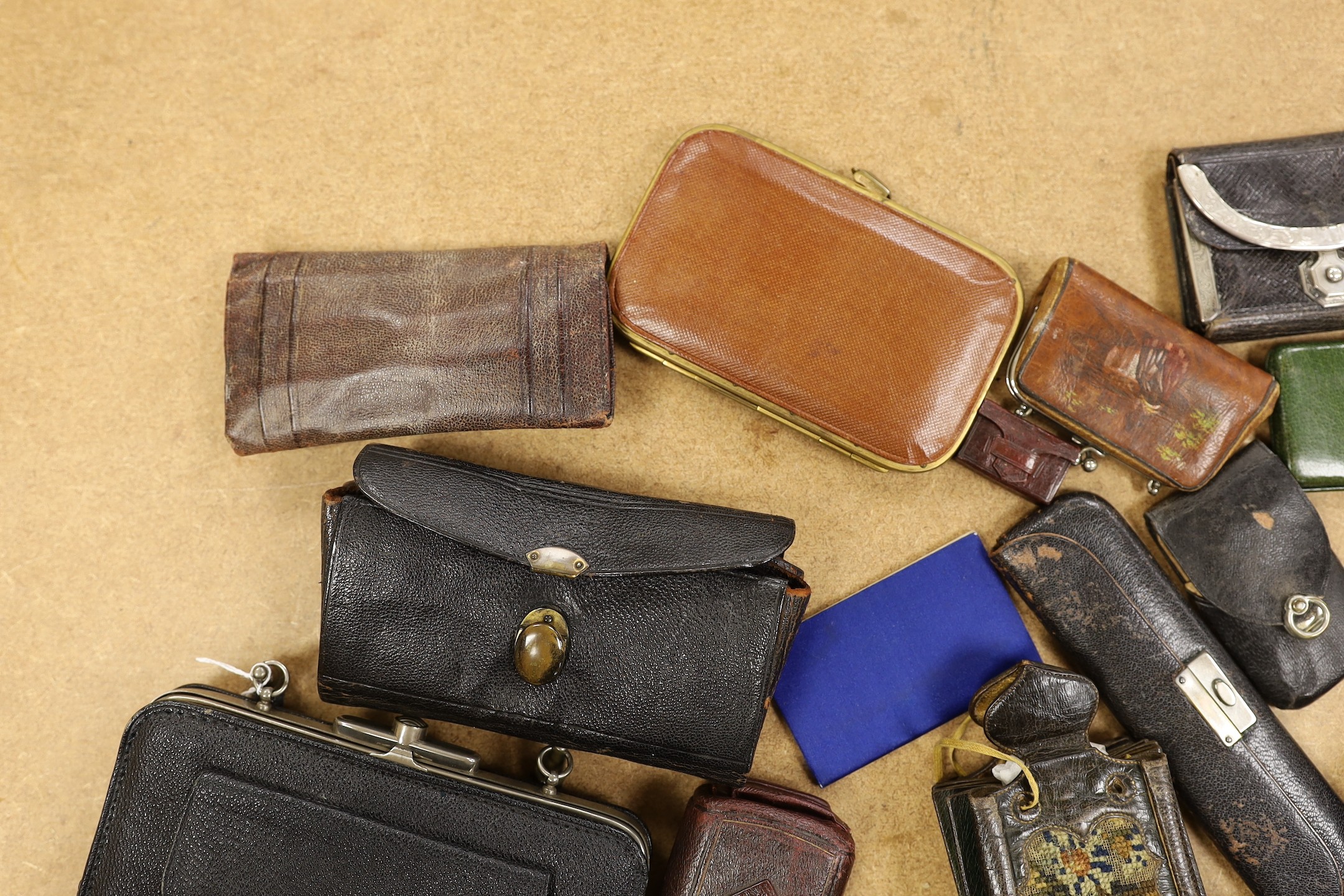 A large collection of unusual Morocco leather purses, bags and containers, some embossed and some with petite point embroidery, mostly 19th century.